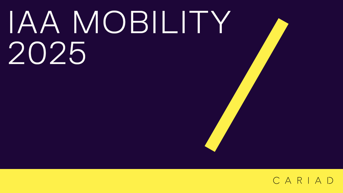 IAA MOBILITY 2025 branding with CARIAD logo on a purple and yellow background.